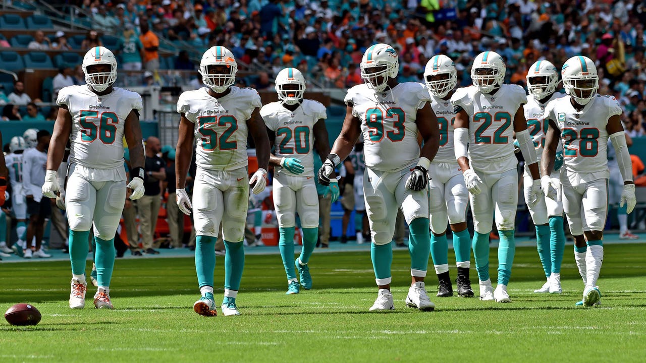 Dolphins arrive at bye week a .500 team with hopes of making playoffs still alive